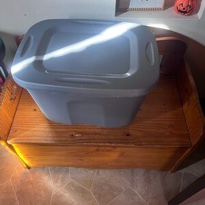 Totes of baby clothes ranging